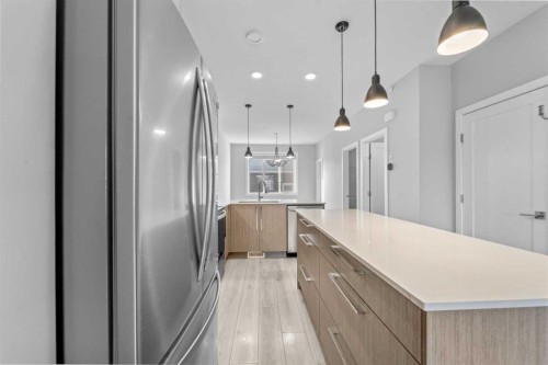 57 Corner Meadows Gate Ne, Calgary, AB - Indoor Photo Showing Kitchen With Upgraded Kitchen