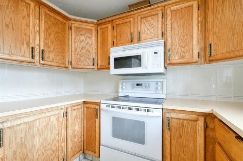 278 Shawnessy Drive Sw, Calgary, AB - Indoor Photo Showing Kitchen