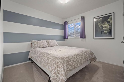 110 Brightonwoods Green Se, Calgary, AB - Indoor Photo Showing Bedroom