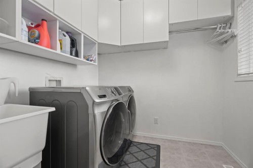 110 Brightonwoods Green Se, Calgary, AB - Indoor Photo Showing Laundry Room