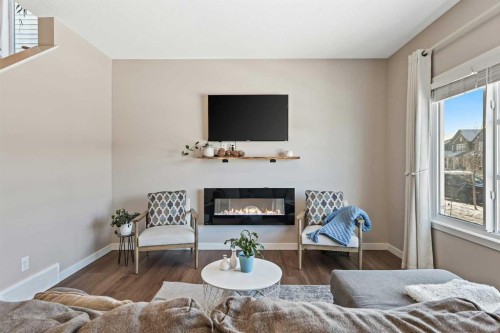 142 Highview Gate Se, Airdrie, AB - Indoor Photo Showing Living Room With Fireplace