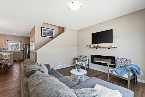 142 Highview Gate Se, Airdrie, AB - Indoor Photo Showing Living Room With Fireplace