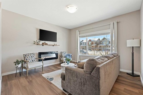 142 Highview Gate Se, Airdrie, AB - Indoor Photo Showing Living Room With Fireplace