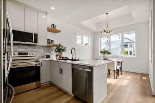 642 Cottageclub Bend, Rural Rocky View County, AB - Indoor Photo Showing Kitchen With Upgraded Kitchen