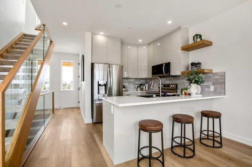 642 Cottageclub Bend, Rural Rocky View County, AB - Indoor Photo Showing Kitchen With Upgraded Kitchen