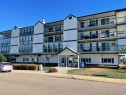 405-1881 17 Street, Didsbury, AB  - Outdoor With Balcony With Facade 