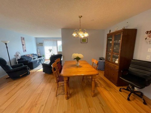 405-1881 17 Street, Didsbury, AB - Indoor Photo Showing Dining Room