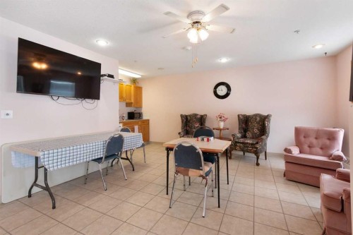 202-5026 49 Street, Olds, AB - Indoor Photo Showing Other Room