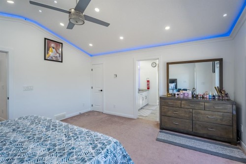248 Sandpiper Boulevard, Chestermere, AB - Indoor Photo Showing Bedroom