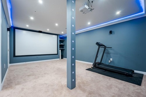 248 Sandpiper Boulevard, Chestermere, AB - Indoor Photo Showing Gym Room