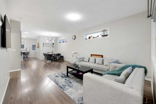 131 Redstone Boulevard Ne, Calgary, AB - Indoor Photo Showing Living Room