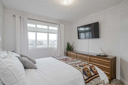 230 Sagewood Grove Sw, Airdrie, AB - Indoor Photo Showing Bedroom