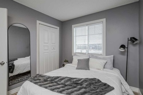230 Sagewood Grove Sw, Airdrie, AB - Indoor Photo Showing Bedroom