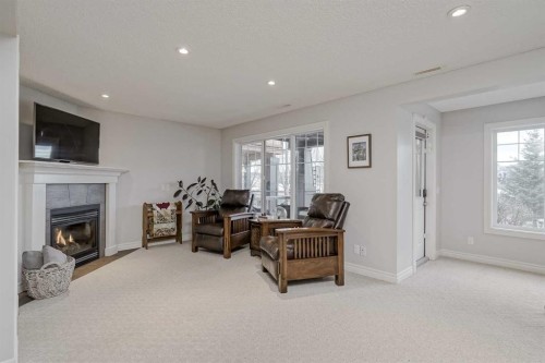230 Sagewood Grove Sw, Airdrie, AB - Indoor Photo Showing Living Room With Fireplace