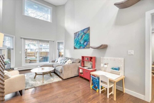 103-1720 13 Street Sw, Calgary, AB - Indoor Photo Showing Living Room