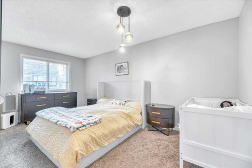 103-1720 13 Street Sw, Calgary, AB - Indoor Photo Showing Bedroom