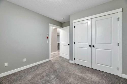 12-606 Lakeside Boulevard, Strathmore, AB - Indoor Photo Showing Other Room