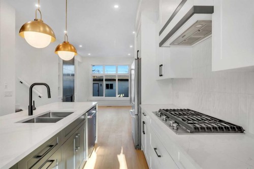 452 22 Avenue Ne, Calgary, AB - Indoor Photo Showing Kitchen With Double Sink With Upgraded Kitchen
