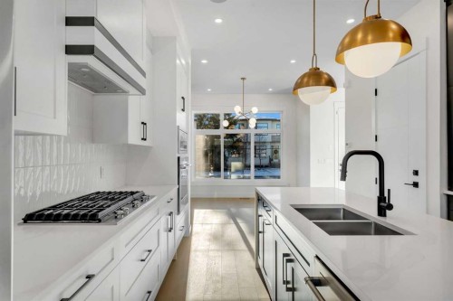 452 22 Avenue Ne, Calgary, AB - Indoor Photo Showing Kitchen With Double Sink With Upgraded Kitchen