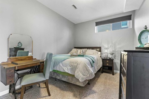 100 Hillcrest Boulevard, Strathmore, AB - Indoor Photo Showing Bedroom