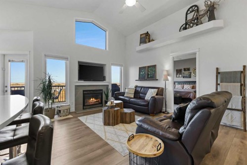 100 Hillcrest Boulevard, Strathmore, AB - Indoor Photo Showing Living Room With Fireplace