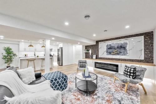 439 Woodland Crescent Se, Calgary, AB - Indoor With Fireplace