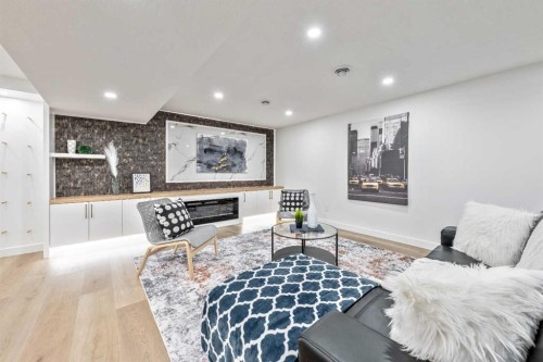 439 Woodland Crescent Se, Calgary, AB - Indoor Photo Showing Living Room With Fireplace