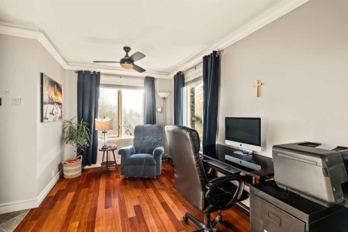 25 Mckinley Bay Se, Calgary, AB - Indoor Photo Showing Office
