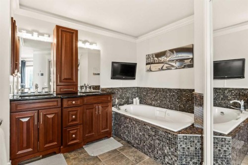 25 Mckinley Bay Se, Calgary, AB - Indoor Photo Showing Bathroom