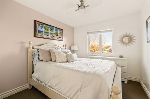 25 Mckinley Bay Se, Calgary, AB - Indoor Photo Showing Bedroom