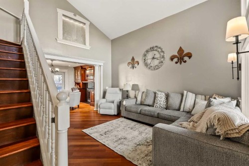 25 Mckinley Bay Se, Calgary, AB - Indoor Photo Showing Living Room
