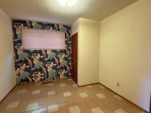 A 111-111 27 Avenue Ne, Calgary, AB - Indoor Photo Showing Other Room