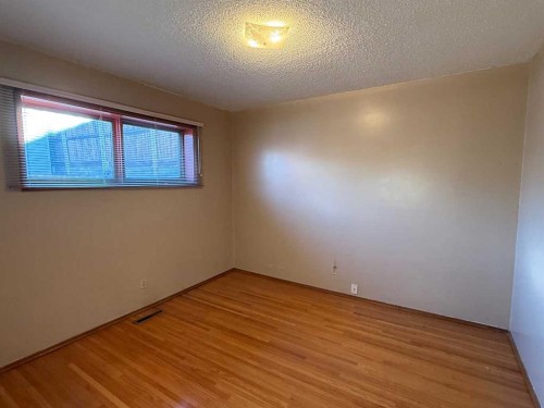 A 111-111 27 Avenue Ne, Calgary, AB - Indoor Photo Showing Other Room