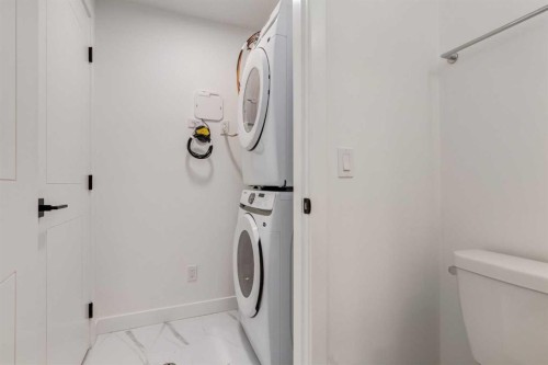 582 Seton Circle Se, Calgary, AB - Indoor Photo Showing Laundry Room