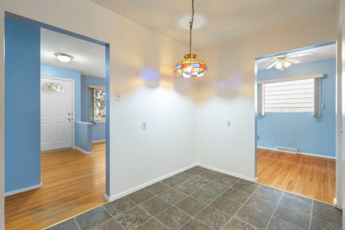 123 Glacier Drive Sw, Calgary, AB - Indoor Photo Showing Other Room