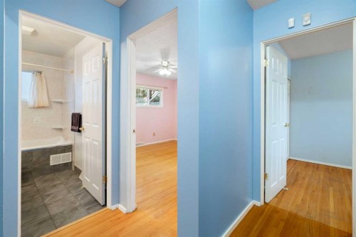 123 Glacier Drive Sw, Calgary, AB - Indoor Photo Showing Other Room