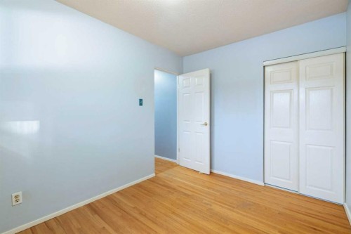 123 Glacier Drive Sw, Calgary, AB - Indoor Photo Showing Other Room