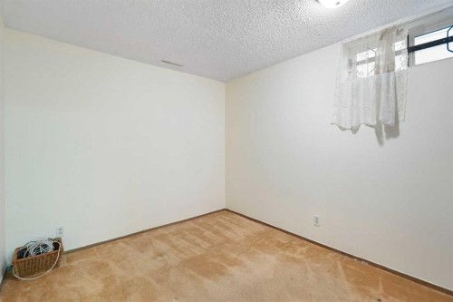123 Glacier Drive Sw, Calgary, AB - Indoor Photo Showing Other Room
