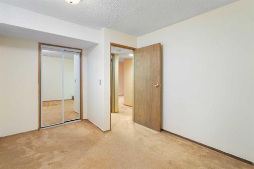 123 Glacier Drive Sw, Calgary, AB - Indoor Photo Showing Other Room