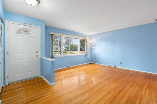 123 Glacier Drive Sw, Calgary, AB - Indoor Photo Showing Other Room