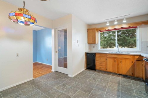 123 Glacier Drive Sw, Calgary, AB - Indoor Photo Showing Other Room