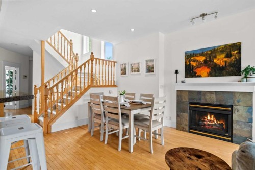 3111 39 Street Sw, Calgary, AB - Indoor Photo Showing Living Room With Fireplace