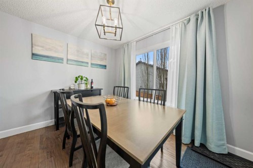42 Tuscany Meadows Bay Nw, Calgary, AB - Indoor Photo Showing Dining Room