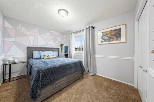 42 Tuscany Meadows Bay Nw, Calgary, AB - Indoor Photo Showing Bedroom