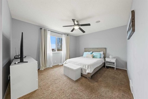 42 Tuscany Meadows Bay Nw, Calgary, AB - Indoor Photo Showing Bedroom