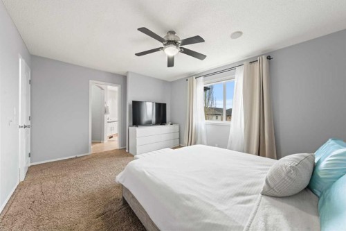 42 Tuscany Meadows Bay Nw, Calgary, AB - Indoor Photo Showing Bedroom