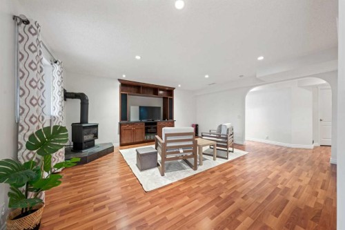 42 Tuscany Meadows Bay Nw, Calgary, AB - Indoor With Fireplace