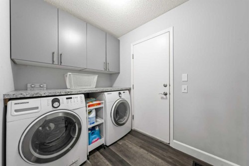 42 Tuscany Meadows Bay Nw, Calgary, AB - Indoor Photo Showing Laundry Room