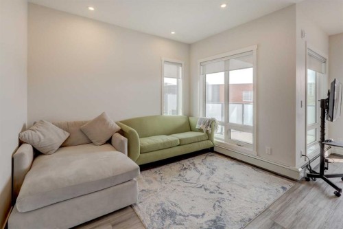 315-138 Sage Valley Common Nw, Calgary, AB - Indoor Photo Showing Living Room