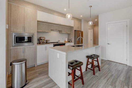 315-138 Sage Valley Common Nw, Calgary, AB - Indoor Photo Showing Kitchen With Upgraded Kitchen
